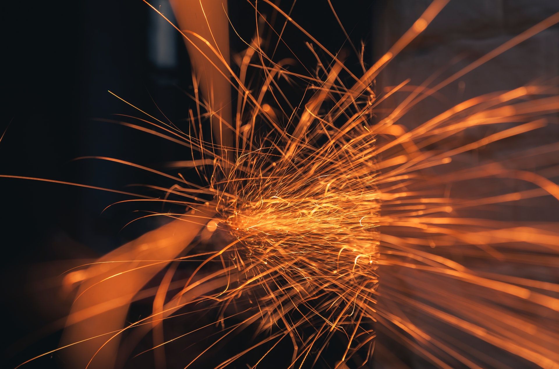 Grinder creating sparks via friction