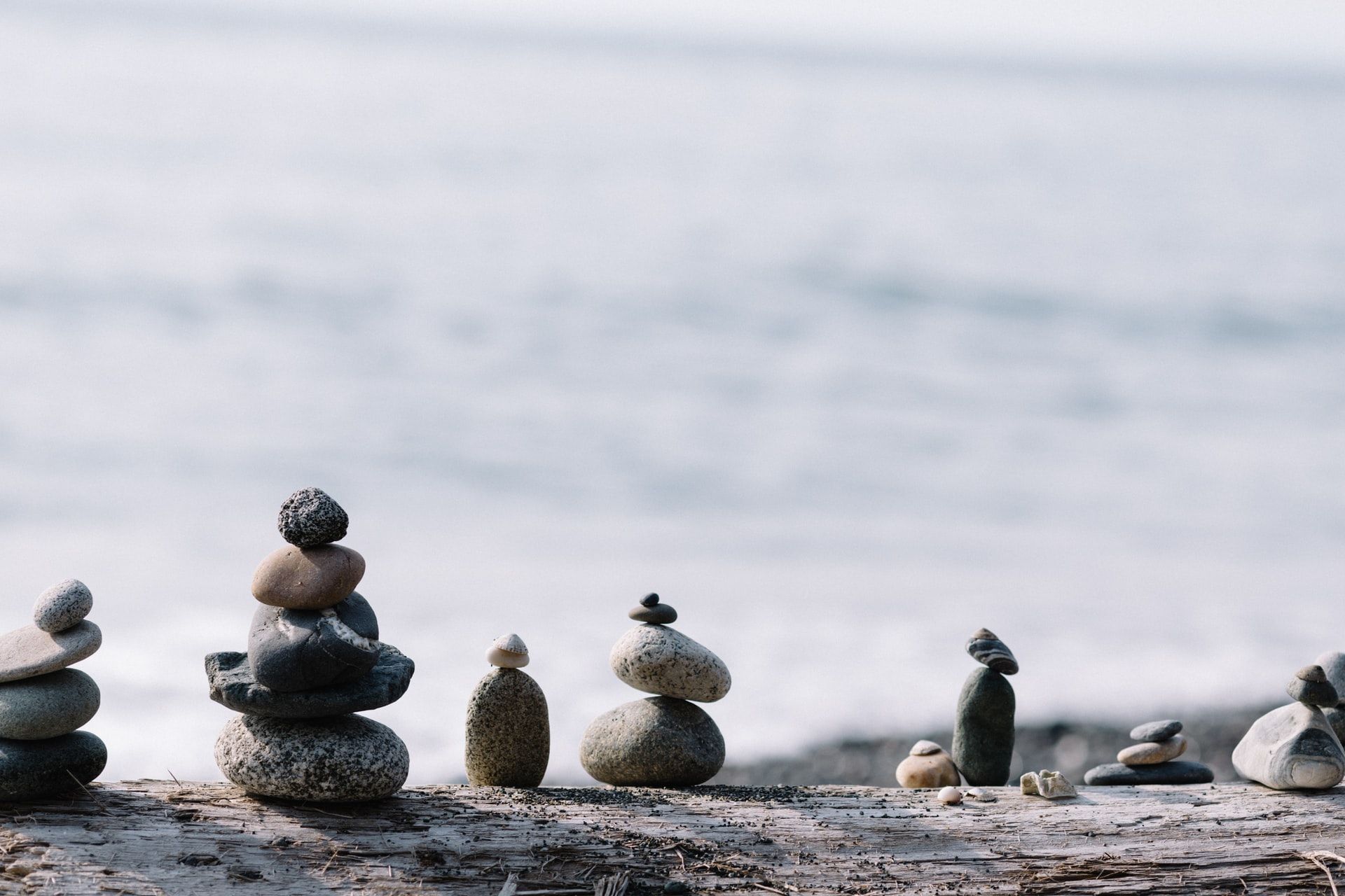 Small rounded stones balanced on one another