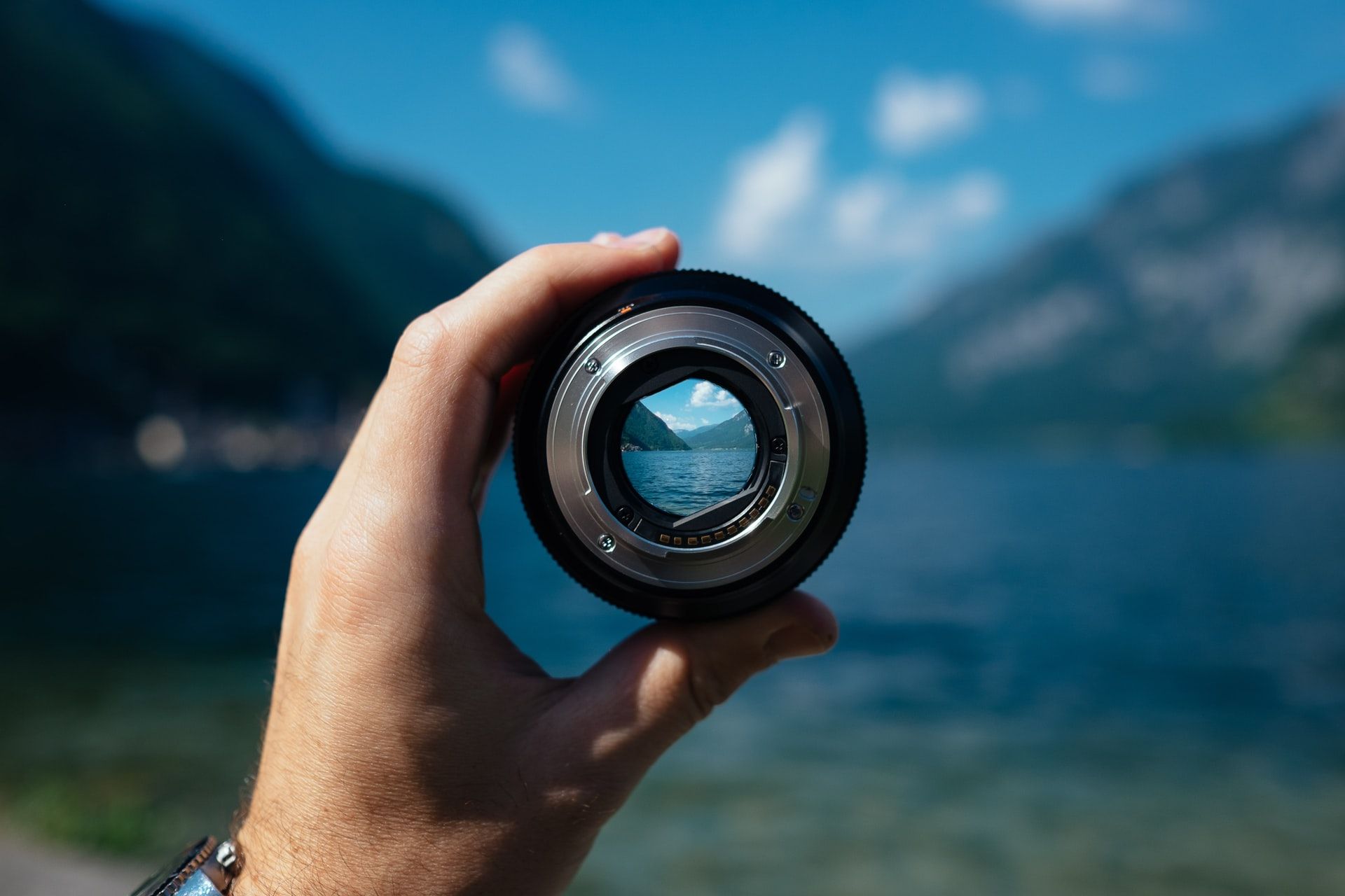 Looking at a view of a lake through a camera lens