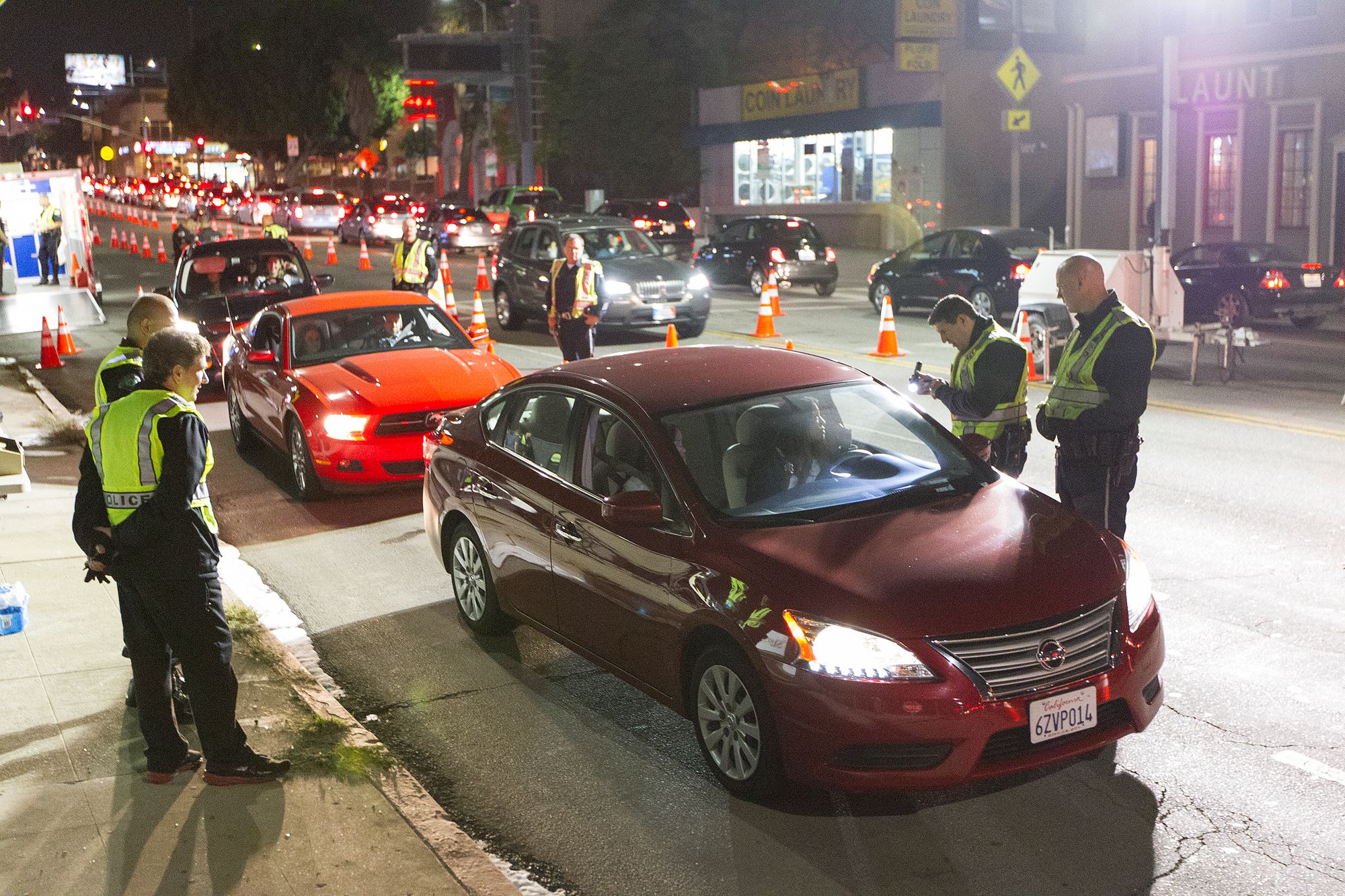 Officers from the Los Angeles Police Department conduct sobriety tests at a checkpoint in Hollywood over the Memorial Day weekend.